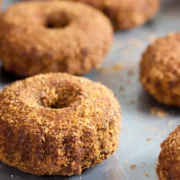 Tray of freshly made vegan apple cider doughnuts