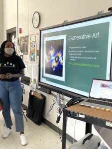 Student giving presentation on generative art